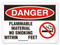 A photograph of a 01563 danger, flammable material no smoking within __ feet OSHA sign with no smoking icon.