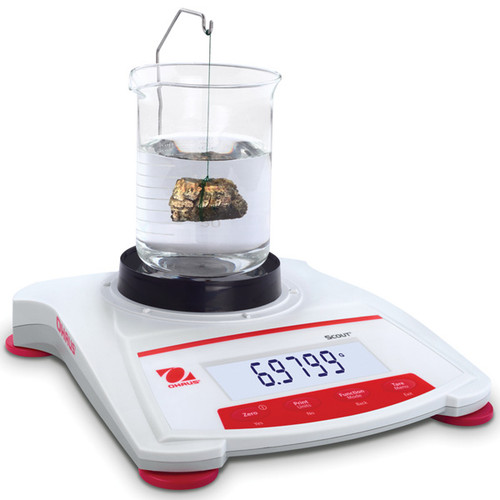 Photograph of a Ohaus Density Determination Kit for Scout® Balances in use (beaker and balance not included).