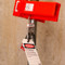 A photograph of a 07267 stainless steel lockout hasp installed on a lockout tagout device.