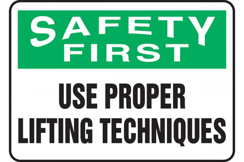 A photograph of a green and white 12309 safety first, use proper lifting techniques sign.