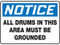 A photograph of a 01571 notice all drums in this area must be grounded osha signs.