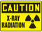 A photograph of a 01601 caution x-ray radiation osha signs with radiation symbol.