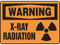 A photograph of a 01602 warning x-ray radiation OSHA sign with radiation symbol.