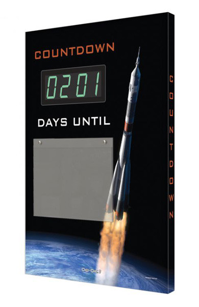 A photograph of a 06215 countdown digi-day® 3 electronic scoreboard: days until w/ rocket.