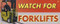 Drawing of the orange and white Watch For Forklifts safety banner.