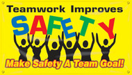 Picture of Workplace Safety Banner that features a colorful yellow background, and wording of "Teamwork Improves Safety" in colorful green, red, black, and blue text being held up by a team of stick figures. Below is the wording "Make Safety A Team Goal!" in bold yellow and red text.