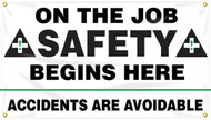 Picture of Workplace Safety Banner that features a professional white background, and wording of "On The Job Safety Begins Here" in bold black text, flanked by two ANSI-style safety crosses. Below is the wording "Accidents Are Avoidable" in clear black text.