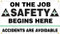 Picture of Workplace Safety Banner that features a professional white background, and wording of "On The Job Safety Begins Here" in bold black text, flanked by two ANSI-style safety crosses. Below is the wording "Accidents Are Avoidable" in clear black text.