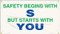 Picture of Workplace Safety Banner that features a professional white background, and wording of "Safety Begins With S" in bold green and blue text. Below is the wording "But Starts With You" in visible blue and green text.