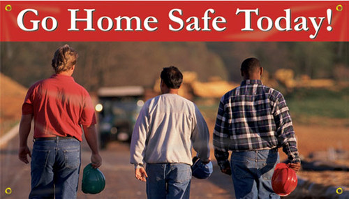 Picture of Workplace Safety Banner that features picture of three men headed off after a hard day of work. They are all carrying their hard hats in hand as they are off the worksite now. Along the top is red stripe that has eye catching white text that reads "Go home safe today!".
