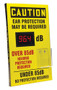 A photograph of a yellow 11102 OSHA caution decibel meter sign with 20" l x 12" w dimensions,  and ear plug dispenser.