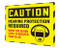 A photograph of a yellow and black 11105 OSHA caution industrial decibel meter sign, reading hearing protection required when the sound level is greater than 85 dB, and dimensions 30" x 36" .