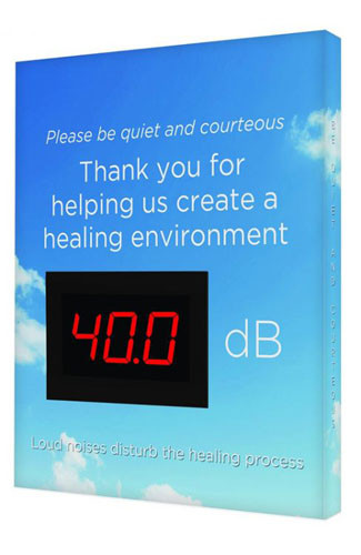 A photograph of a blue 11109 healthcare decibel meter sign, reading please be quiet and courteous, with clouds graphic, and dimensions 12" x 10".