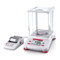 Photograph of Ohaus Adventurer® Analytical Balance with draft shield  closed, left facing,  with optional portable printer.