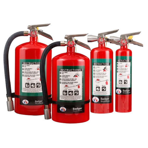 A group photograph of (left to right) 11.5, 15.5, 5, and 2.5 pound Badger  Extra Halotron- I Fire Extinguishers.
