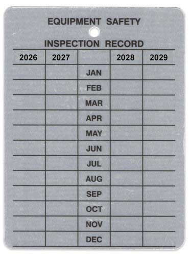 Metal tag with EQUIPMENT SAFETY INSPECTION RECORD header and grid with 2026 through 2029 for monthly punching/marking.