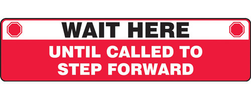 A photograph of a red and white 11204 social distance floor sign, reading wait here until called to step forward, with dimensions 6" x 24", and stop icons.