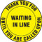 A photograph of a yellow and black 11241 social distance floor sign, reading thank you for waiting in line until you are called upon.