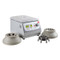 Photograph of Ohaus Frontier™ 5706 Multi-Function Centrifuge, right facing, lid closed, displaying optional rotors.