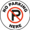 A photograph of a white and black 11255 pavement print sign, reading no parking here, with no parking symbol.