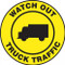 This black and yellow sign reads "Watch Out Truck Traffic" in a yellow strip along the border. The center features a black image of a truck on a yellow background. Use in areas that see frequent truck traffic and usage.