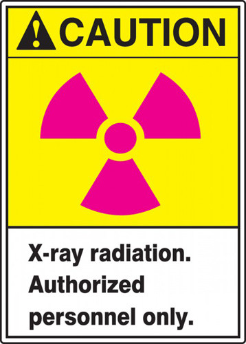 This sign has an ANSI CAUTION header on a yellow background, a magenta international radiation symbol, and a white text box with "X-ray radiation. Authorized personnel only." in black text.