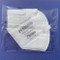 Image of individually packaged 5160 mask folded flat on a blue background.