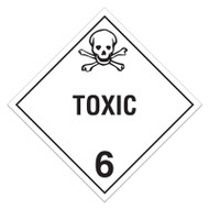 White placard with black border has a skull and crossbones icon at the top, the word TOXIC in the middle, and "6" at the bottom.