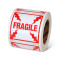Photograph of a roll of Speciality Handling Labels, "Fragile" .