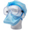 An oblique view photograph of a mannequin head wearing an ACI Model 3120 NIOSH-Certified Surgical N95 Respirator and other PPE.