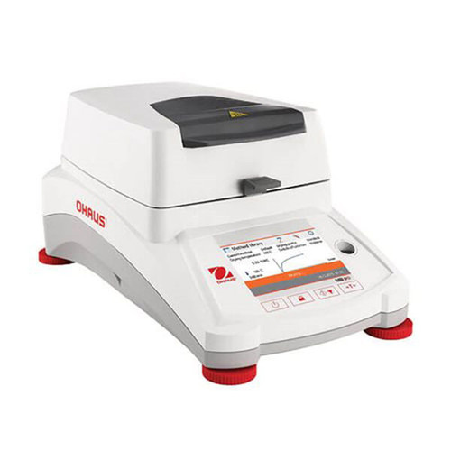 Photograph of an Ohaus MB90 Moisture Analyzer, closed, right-facing.