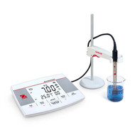 Photograph of an Ohaus AB23PH Benchtop meter in use.  (Electrode is available with AB23PH-F package or bought separately).