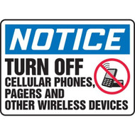 Photograph of a an OSHA sign that reads: NOTICE (in white lettering on blue banner) TURN OFF CELLULAR PHONES,PAGERS AND OTHER WIRELESS DEVICES (in black lettering on white background).  There is a graphic of a cell phone in a red circle with a red line through it on the right side of the sign.