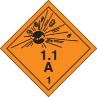 An orange and black photograph of a 03062 dot explosives shipping label, reading 1.1A 1 with graphic.
