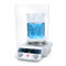 Photograph of an Ohaus Next Generation Guardian™ 5000 Round Top Hotplate Stirrer, with optional splash shield, demonstrating large volume stirring (beaker not included).