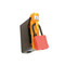 An image showing the lockout device installed and locked with a red safety padlock.