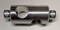A side view photograph of an AAP150 90° Rod Connector and Clamp Holder.