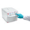 A photograph of an Ohaus Frontier™ FC5706P Multi-Function Centrifuge, facing right, lid closed, demonstrating dial operation.