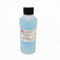 A photograph of 10.01 pH buffer solution.