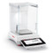 Photograph of Ohaus Explorer Plus® Precision Balance, right facing, with draft shield closed.