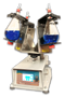 A photograph of a 21212 mid range 3d shaker unit w/ optional holders.