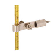 Photograph of a Wall Mounted Thermometer and Tubing Clamp holding a thermometer (not included.)