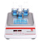 Picture of Ohaus Digital Light Duty 3 mm Orbital Shaker, front facing, carrying load.  Platform and glassware not included.