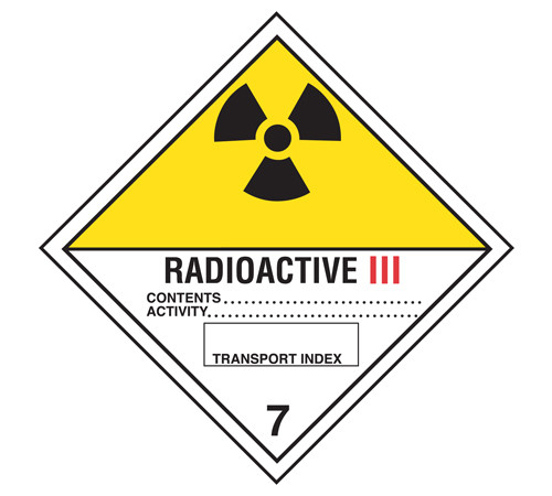 A photograph of a 03054 class 7 radioactive iii dot shipping labels, with 500 per roll.