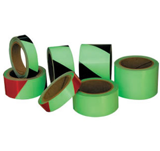 A photograph of a multiple types of 06378 glow in the dark hazard and safety tapes.