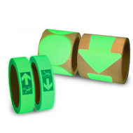 A photograph showing one roll each of glow in the dark left arrows, right arrows, 3" spots, and 4" arrows.