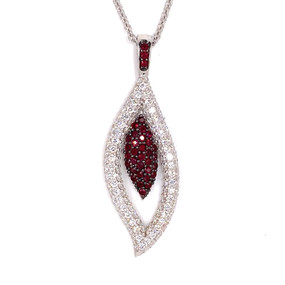 Pendant contains 0.86 cts of Rubies and 2.37 cts of Diamonds on a 20 inch round cable chain. 
