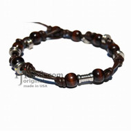 Leather bracelet or anklet with metal and wooden beads