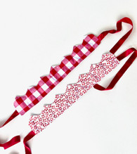 set of 6 red and white Christmas hats
