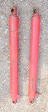 Pair of used loader rams. Single acting.  33 ¼ inch between centres closed. 3 inch OD. £150 plus VAT. Buyer to collect. 